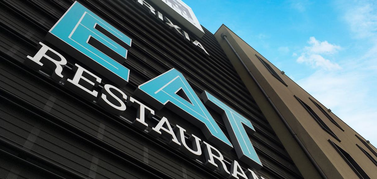 Insegna EAT Restaurant